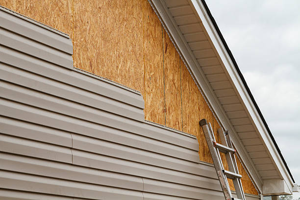 Professional Emergency Siding Repair technician working in College Park, MD